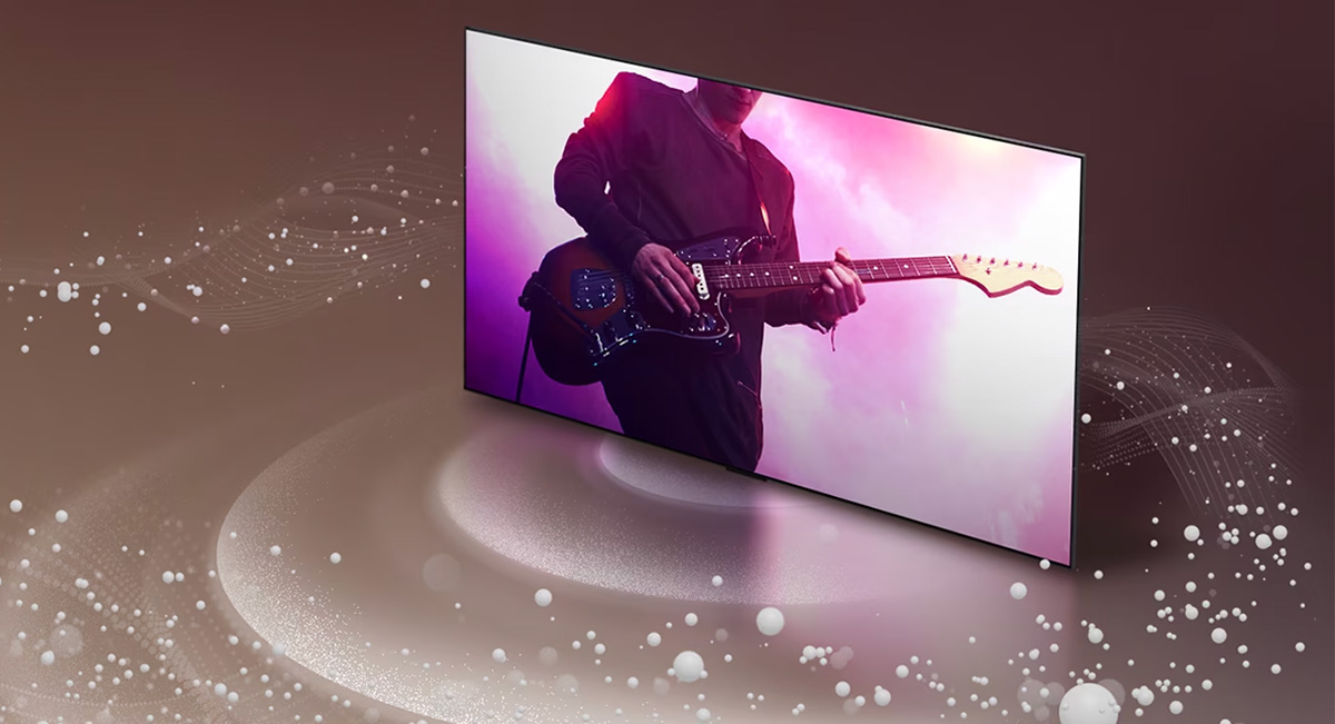 Μια LG OLED TV με φυσαλίδες ήχου και κύματα να εκπέμπονται από την οθόνη και να γεμίζουν τον χώρο.